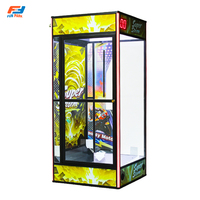 Machine de jeu commerciale verticale à monnayeur, type 'Cash Grab', avec système de soufflage de billets et de capture de bons de réduction, en format borne d'arcade