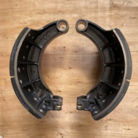 Camions lourds Shacman Delong avec nouveau système d'essieu arrière HD MAN Series, ensemble de plaquettes de frein à tambour de 410 mm en fonte HD90149340093