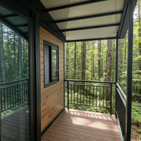 Maisonnette préfabriquée moderne de luxe en acier extensible avec terrasse étanche et porte vitrée pour villa et chambre à coucher