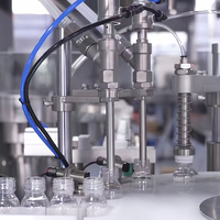 Machine automatique de remplissage de flacons d'huile de 10 ml à 200 ml pour ligne de production, machine de remplissage, de bouchage et d'étiquetage d'huiles aromatiques