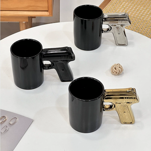 Nuova <span class=keywords><strong>Tazza</strong></span> Personalizzata in <span class=keywords><strong>Ceramica</strong></span> da 350ml a Forma di Pistola Americana <span class=keywords><strong>con</strong></span> Manico 3D Oro/Argento per Caffè e Birra - Product Image 6
