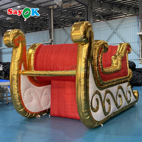 Grande luge gonflable géante de Père Noël pour la décoration de Noël et la promotion d'événements