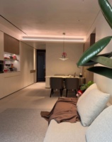 Meuble TV et mur audiovisuel minimalistes modernes, intégration murale complète, design sans poignées, effet d'éclairage doux