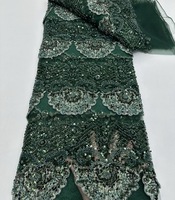 Dentelle française festive, matériau en dentelle filet perlée et pailletée, idéale pour les mariages, les fêtes et les événements culturels.