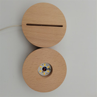 Base de veilleuse ronde en plastique ABS de sortie d'usine blanche avec multicolore pour lampe en bois acrylique Design minimaliste pour salon