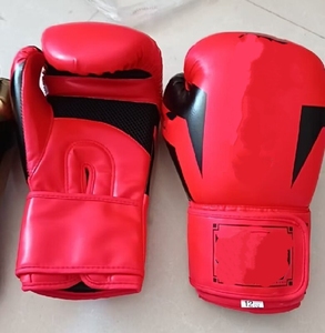 قفازات ملاكمة احترافية مقاومة للماء من الجلد الصناعي للتدريب في الصالة الرياضية بشعار مخصص، متوفرة بأحجام من 6 إلى 12 أونصة - Product Image 5