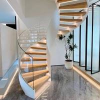 Escalier en colimaçon incurvé sur mesure, structure en acier haut de gamme, grand escalier artistique de luxe pour villa