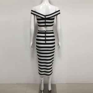 Élégant Ensemble Deux Pièces Rayé <span class=keywords><strong>Noir</strong></span> <span class=keywords><strong>et</strong></span> <span class=keywords><strong>Blanc</strong></span> pour Femme – Haut Court Épaules Dénudées <span class=keywords><strong>et</strong></span> Jupe Midi avec Boutons Dorés, <span class=keywords><strong>Tenue</strong></span> de Soirée Formelle - Product Image 5