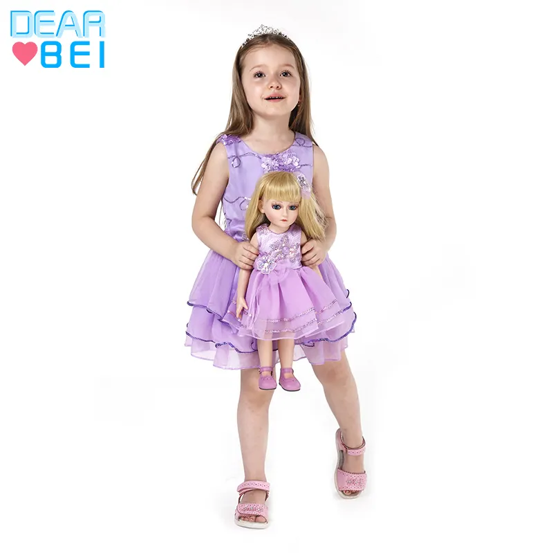 Muñecas de 18 pulgadas y ropa de vestir púrpura para niños, juguete de muñeca de bebé Reborn, personalizable en Stock, juguete de vestido de muñecas al por mayor