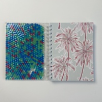 A5 vente en gros spirale liquide huile flottant cahier couverture en PVC souple avec des boules de PVC rouge bleu vert