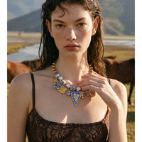 Collier élégant JINYOU 5881 avec pendentif cœur en céramique émaillée bleu et blanc, perles en céramique et acier inoxydable, et breloque animale en métal