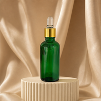 Flacon compte-gouttes de luxe en verre vert foncé écologique et réutilisable pour huiles essentielles de massage avec collier doré