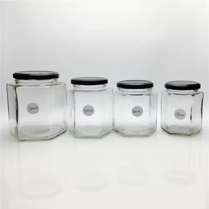 Vente <span class=keywords><strong>en</strong></span> gros Récipient alimentaire <span class=keywords><strong>en</strong></span> pot de miel <span class=keywords><strong>en</strong></span> verre hexagonal avec couvercle 25ml 40ml 100ml 180ml 280ml 380ml 500ml 720ml - Product Image 1