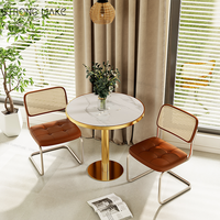 Chaises et tables de restaurant de luxe en marbre doré en acier inoxydable rond, ensembles de chaises et de tables de restaurant