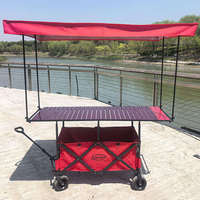 Chariot pliable d'extérieur avec table et parasol, design tout-terrain pour un transport facile du matériel et des fournitures de camping