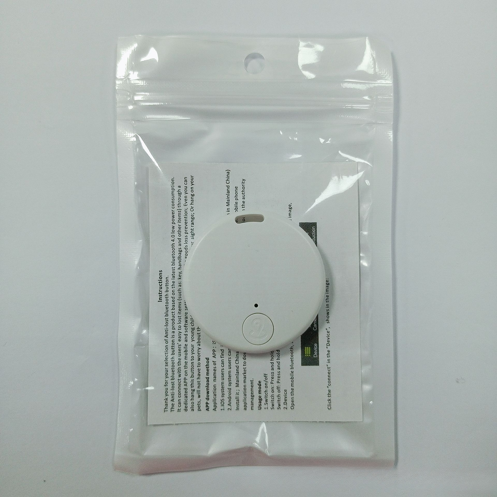 White + pearlescent bag + manual