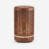 Diffuseur d'arômes ultrasonique cylindrique Faner 0,5 L, design creux imitation bois, idéal pour bureau, lumière douce, chambre à coucher, chevet, compact
