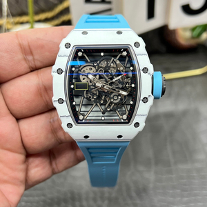 Men's ultra-thin carbon fiber automatic mechanical <b>watch</b> with blue <b>rubber</b> strap and sapphire crystal. - Product Image 1