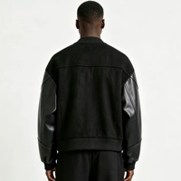 Veste bomber de luxe noire pour homme, style Letterman, avec manches en cuir, coupe courte à épaules tombantes, esthétique urbaine, streetwear haut de gamme