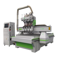 Machine de fraisage CNC à grande vitesse pour le bois, modèle 1325, avec 4 broches et changement d'outil pneumatique, pour portes en bois, économique