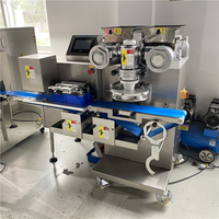 Machine de remplissage et de farce entièrement automatique d'équipement de cuisson intelligent et stable Machine à gâteau de lune à haute capacité économique