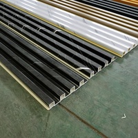 Décorations murales en bois stratifié de haute qualité, panneaux muraux rainurés WPC, panneaux muraux en PVC pour la décoration intérieure