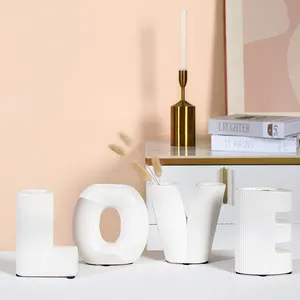 Kreative nordische ins Stil benutzer definierte Brief farbige matte Liebes kreis Blumenvasen Porzellan Donut Donut Keramik Vase Dekoration