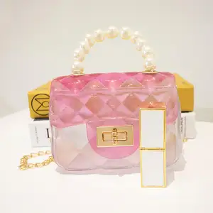 नए डिज़ाइन के मिनी पर्स और हैंडबैग महिलाओं के लिए क्रॉसबॉडी छोटा जेली बैग, बच्चों के लिए मोती के हैंडल वाले महिलाओं के हैंडबैग
