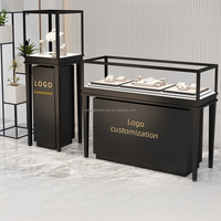 Vitrine à bijoux avec éclairage LED, support en métal et comptoir en verre pour vitrine de magasin