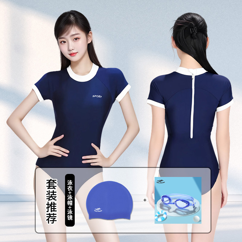 Maillot de bain bleu marine, bonnet de bain et lunettes