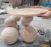 Table basse en travertin naturel, design perlé, table ronde en pierre artisanale sur mesure pour un espace de vie moderne