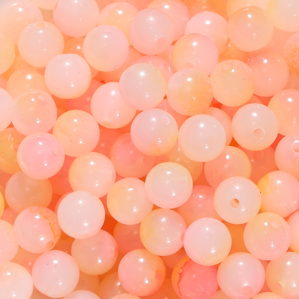 Perles de verre imitation jade bicolores - orange-rose