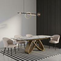 Table à manger rectangulaire extensible en pierre frittée avec base dorée au design italien moderne, livraison en 15 jours