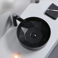Lavabo en porcelaine noir mat et moderne en forme de diamant, lavabo, cuvette de comptoir en céramique pour hôtels