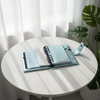 Carnet à spirales A6 en cuir PU à faible MOQ, personnalisable et coloré, avec pochette zippée
