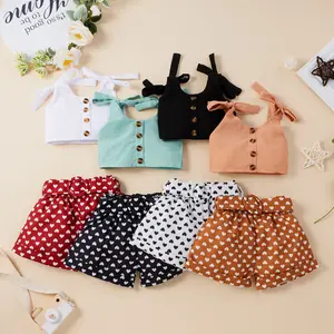 2022 New Wholesale Girls Clothing Cute Bowknot Solid Color Top Love Dot Printing Shorts Two Piece Cartoon Children Kids Clothing