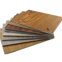 Revêtement de sol SPC LVT à verrouillage 4mm-8mm en PVC avec traitement de surface imitation parquet pour bureaux, supermarchés, gymnases et projets intérieurs