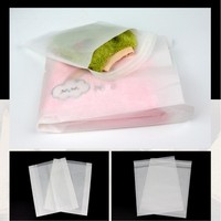 Petit emballage de vêtements recyclable auto-scellé translucide personnalisé, sac en papier de cire de verre doublé blanc eco kraft