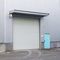 Porte sectionnelle industrielle automatique isolée thermiquement DIAN Electric avec garantie d'un an pour atelier