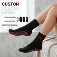 Chaussettes de Pilates personnalisées mi-mollet avec grip, soutien de la voûte plantaire, anti-humidité et anti-odeur, pour le branding