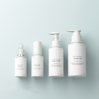 Vente en gros 100ml 150ml 250ml Nettoyant pour soins de la peau Bouteille pour soins de la peau Cosmétiques Ensemble de bouteilles à pompe en mousse plastique de couleur ronde