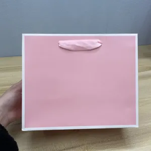 Sacchetto di gioielli regalo per lo shopping rosa in cartone di lusso personalizzato piccolo boutique e sacchetto di carta per imballaggio di gioielli con manico a nastro