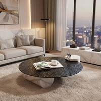 Table basse ronde en verre trempé à texture d'eau ondulée noire de luxe moderne avec pieds en colonne de marbre pour salon