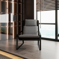 Fauteuil lounge rembourré en tissu pied-de-poule avec structure métallique élégante pour usage domestique