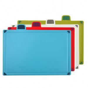 Accesorios de Cocina Más Vendidos, Juego de 4 Tablas de Cortar Inteligentes de Plástico con Código de Color e Indice, con Soporte - Product Image 6