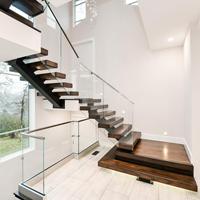 Escalier flottant droit à poutre unique en verre, moderne et de luxe, en métal, pour villa, appartement, hôtel