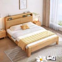 Cadre de lit king size en bois massif moderne sculpté à la main personnalisable avec un grand rangement et une lumière USB multifonctionnelle