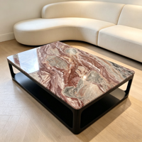 Table basse de luxe Monica en marbre rouge pour salon, grand modèle, avec plateau ajouré moderne et piétement surélevé