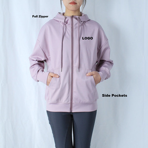 Veste d'équitation pour femme ARLAN, coupe ajustée, en duvet et polaire, résistante aux intempéries, couleur beige, vente directe usine, idéale pour la compétition. - Product Image 1