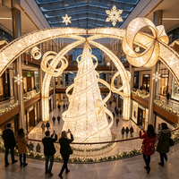 Grandes lanternes de Noël commerciales, décorations lumineuses en forme de tunnel et arches de Père Noël pour les événements festifs